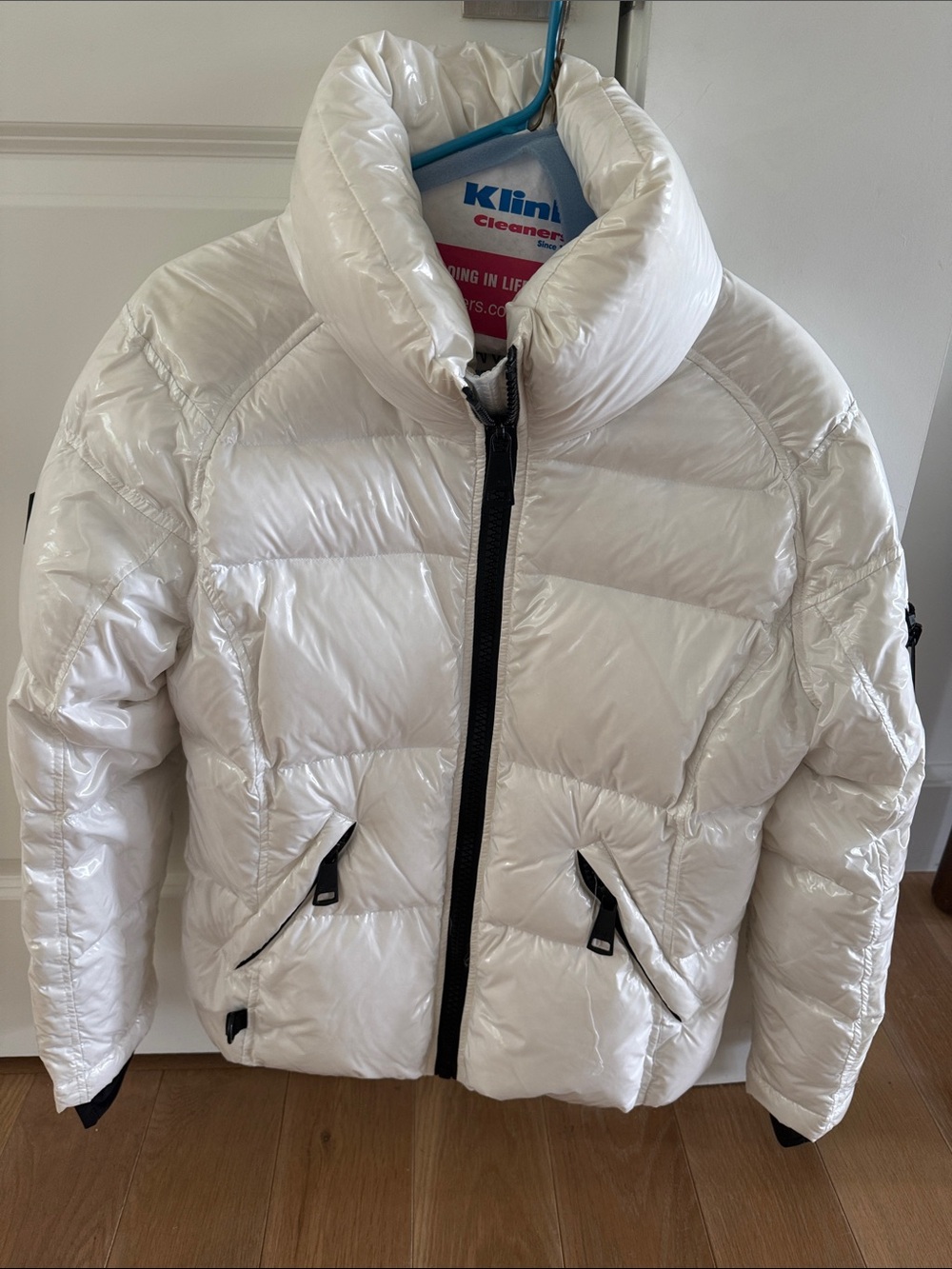 SAM. White High-Shine Puffer Jacket with Black Trim
